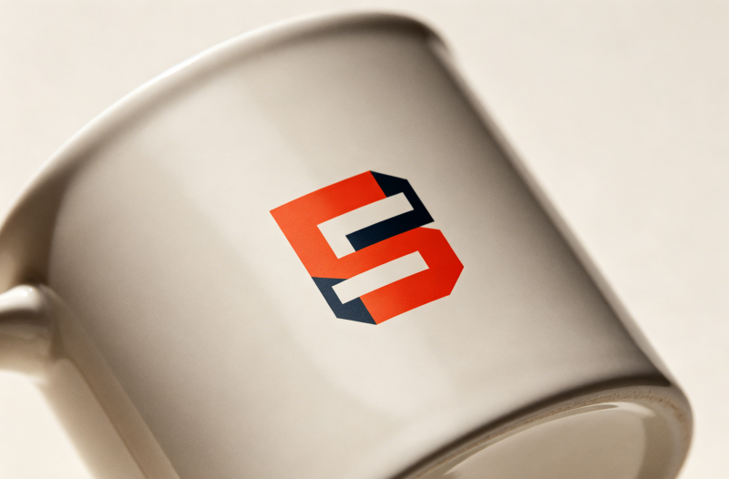 Mug Product Details Close-up of a custom printed logo on a ceramic mug