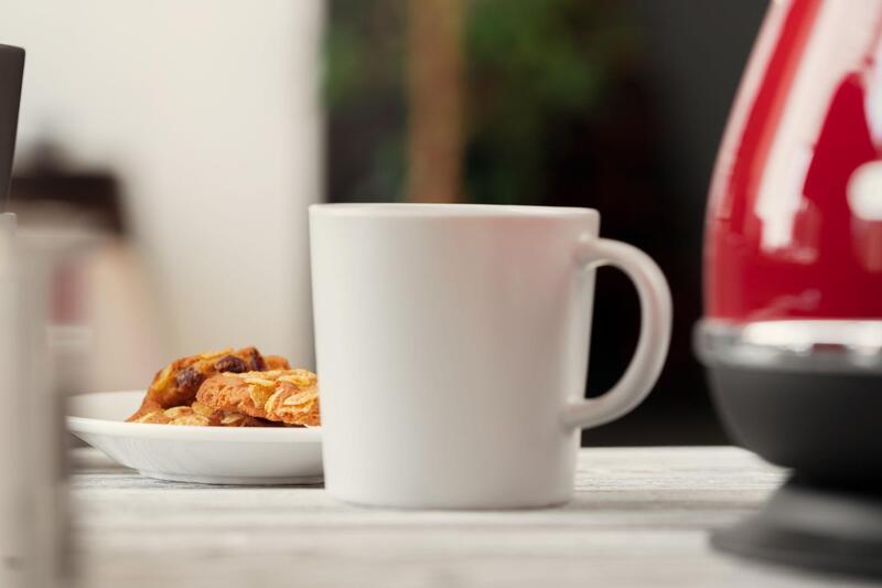 A well-manufactured ceramic mug with an intact glaze and no metallic decoration is generally microwave safe.