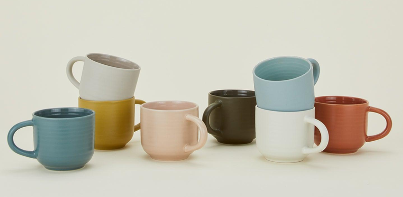 Ceramic Mug Design Trends A collection of ceramic mugs in various trending styles