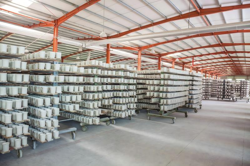 Order Volume and MOQ for Ceramic Mugs Pallets of boxed ceramic mugs in a warehouse