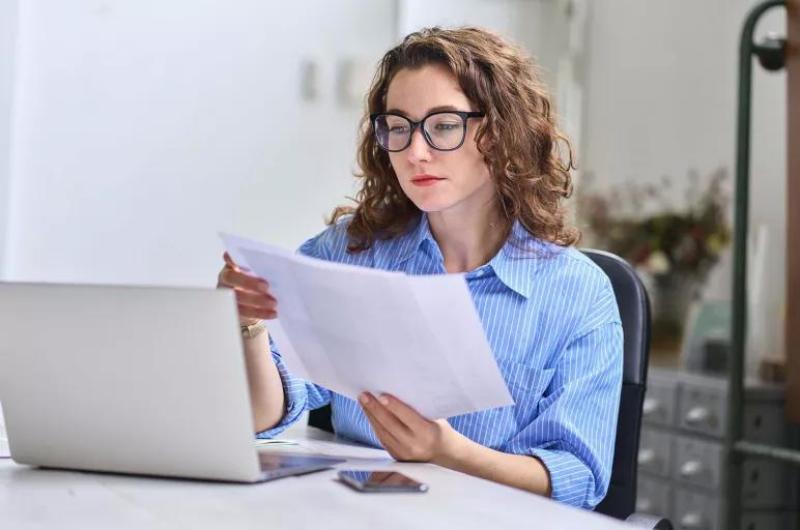 Vetting a Supplier's FDA Compliance Claims Buyer reviewing ceramic drinkware compliance documents