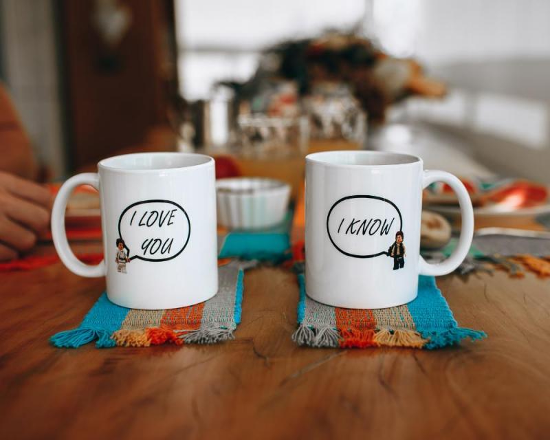 Screen Printing vs Decal Printing on Mugs A close-up of a screen-printed mug next to a decal-printed mug