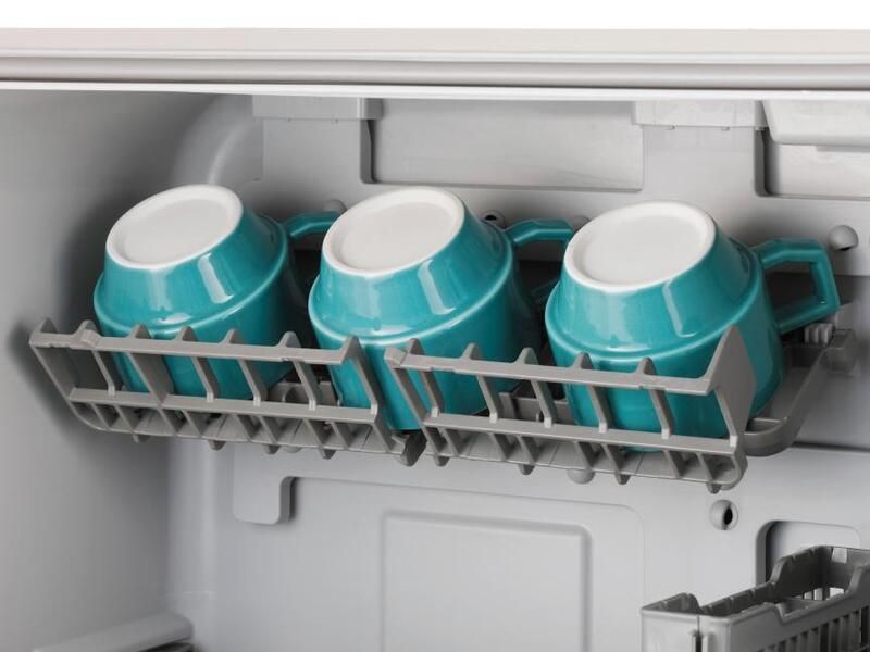 commercial grade ceramic mugs Commercial-grade ceramic mugs being cleaned in a restaurant dishwasher