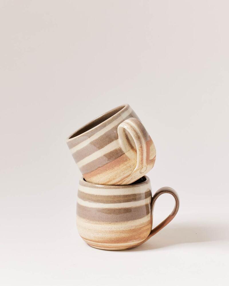 Irregularly Shaped Mug An irregularly shaped, non-stackable ceramic mug
