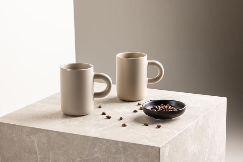 Minimalist Ceramic Mug A simple, clean white ceramic mug with a matte finish