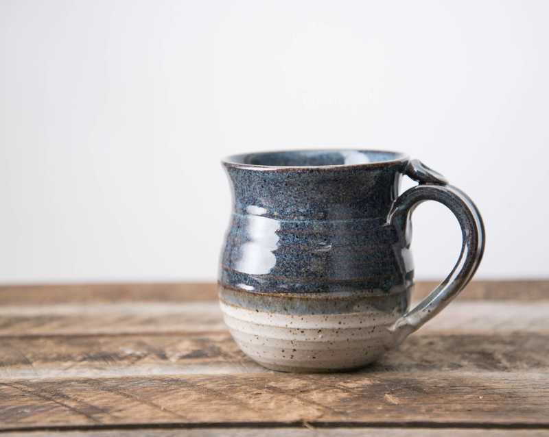 Stoneware vs. porcelain mug comparison Stoneware mug and porcelain mug shown side by side for durability and appearance comparison.