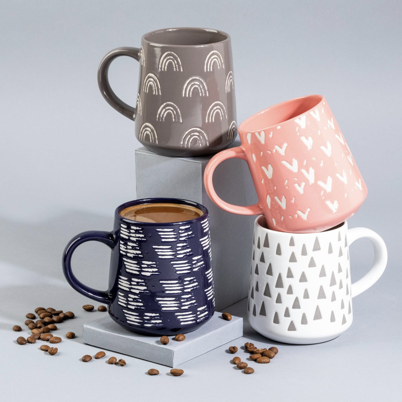 Different types of ceramic mugs Different types of ceramic mugs made from porcelain, stoneware, and bone china displayed together.