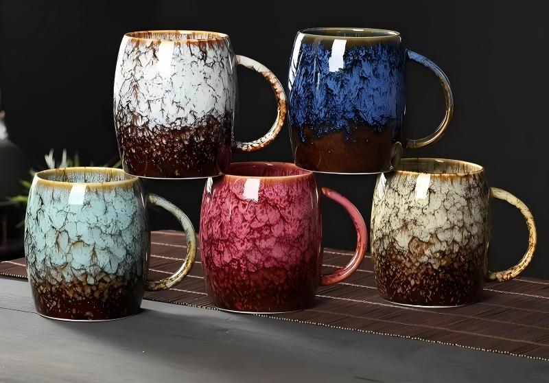 Close-up of a reactive glaze finish on a ceramic mug, showing unique patterns